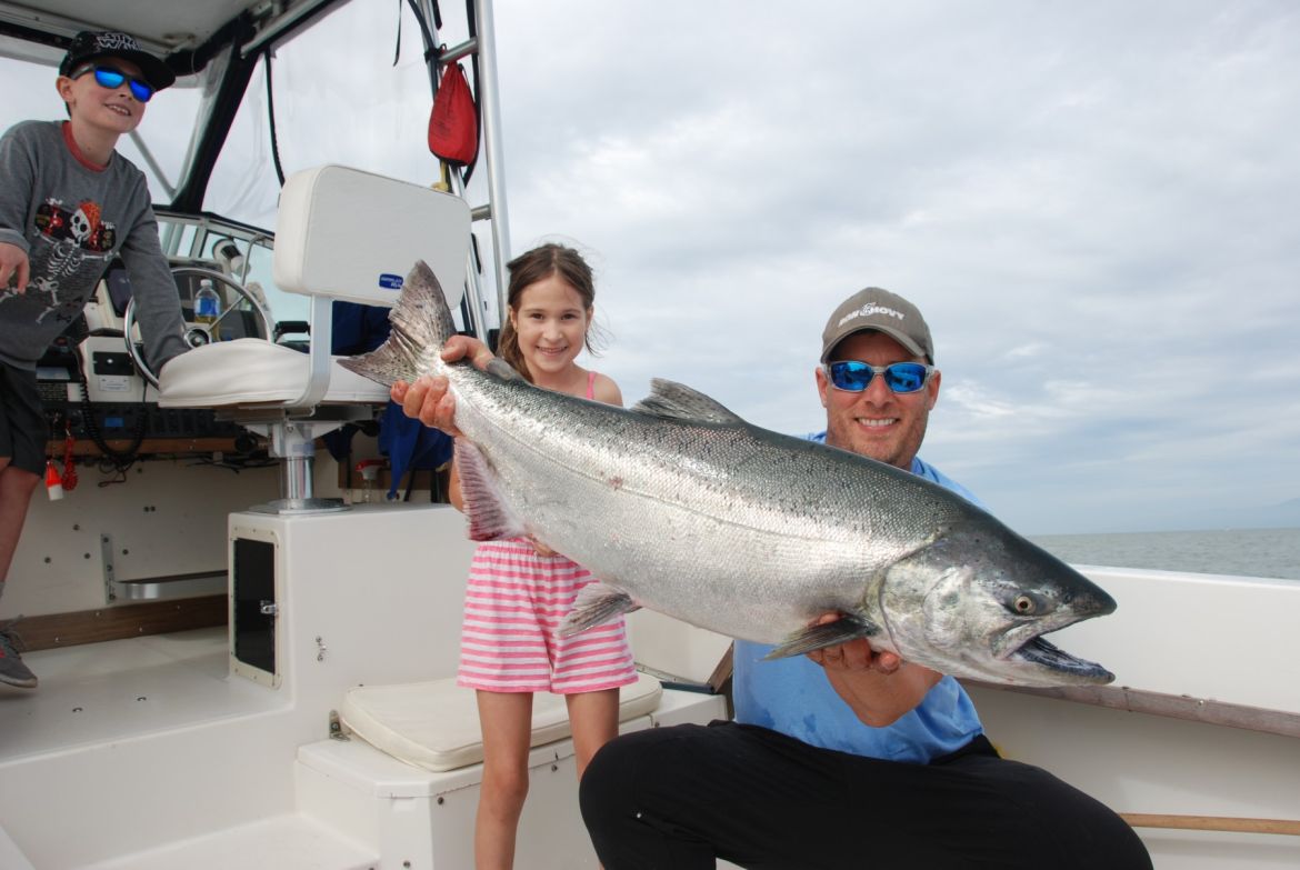 Vancouver Fishing Guide with a big salmon in Vancouver, BC